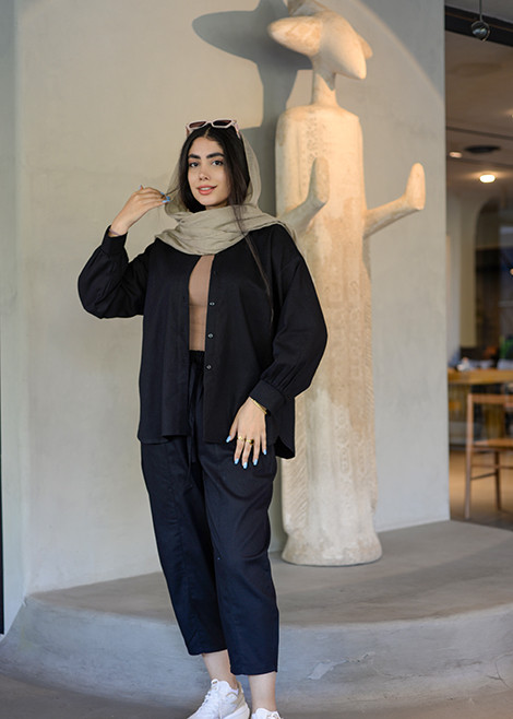 جزئیات دوخت دقیق شومیز مشکی با آستین بلند