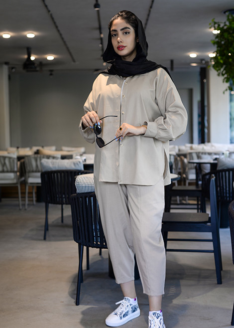 شلوار لینن کرم زنانه با برش آزاد و فاق استاندارد